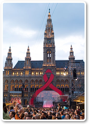 Vienna city hall plays backdrop to the city's annual Life Ball fundraiser, which coincided with the conference opening.