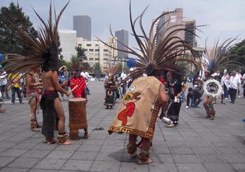 Indigenous dancers at the Universal Access March