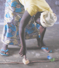A young woman survivor of child trafficking and gang rape in Togo, West Africa.