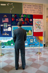 President Barack Obama views a section of the AIDS quilt on display in the Booksellers area of the White House, July 18, 2012. (Official White House Photo by Pete Souza).