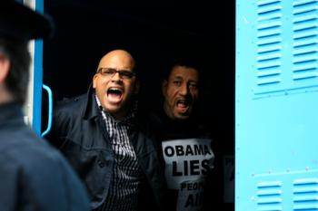 Housing Works' Johnny Guaylupo and ACT UP Philadelphia's Jose de Marco after being arrested.