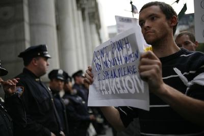 Protesters speak out against excessive use of force by NYC police.