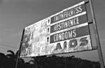 AIDS billboard along airport hughway into Kampala