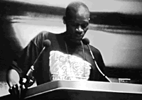 Winstone Zulu of Kara Counseling, Zambia, reminds delegates that the fight against HIV/AIDS continues after the closing ceremony on July 3 