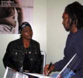 Prevention Counseling Manager Kevin English (right) worked with ASP volunteer Carolyn Morgan (left) on counseling techniques in the early days of ASP's Prevention Services Department.