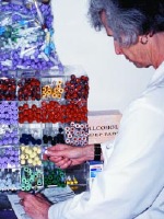 Suzette Chafey, a nurse practitioner at UCLA, records data from blood specimens. (Photo by Paul Antico.)