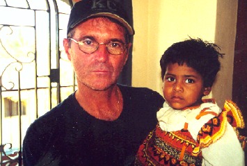 Robert Bilheimer, Director, with 18 month old Jansi, an AIDS orphan (CHES AIDS Orphanage, Chennai, Tamil Nadu, India)