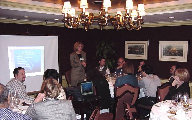 Susan Plaeger, Ph.D., the keynote speaker, addresses the audience over dinner on some new priorities in HIV basic science research.