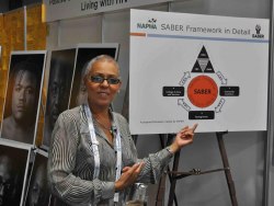 Mimi promoting SABER at NAPWA's booth.