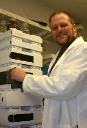 University of Utah bioengineer Patrick Kiser analyzes polymers used to develop a new kind of AIDS-preventing vaginal gel for eventual use by women in Africa and other impoverished areas. The newly invented gel would be inserted a few hours before sex. During intercourse, polymers -- long, chain-like molecules -- within the gel become 