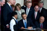 President Obama signs the Affordable Care Act into law in 2010!