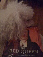 Sophie laying on one of my last reads.